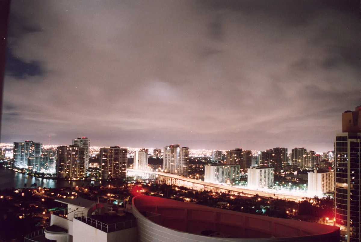 Aventura skyline of residential towers at night